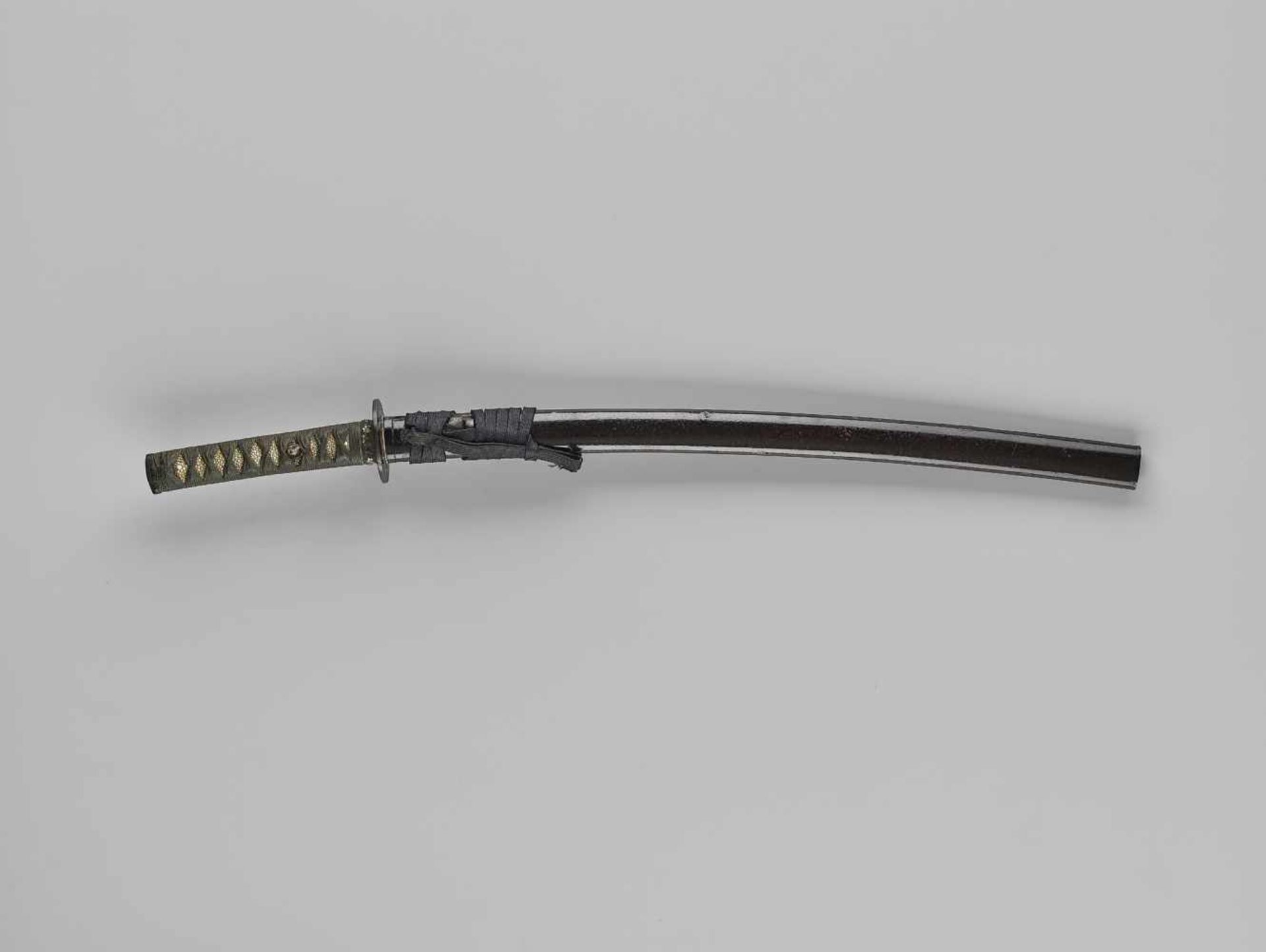 KANESHIGE: A WAKIZASHI IN KOSHIRAE By Kaneshige, signed Kumamoto ju Fujiwara KaneshigeJapan, mid-Edo