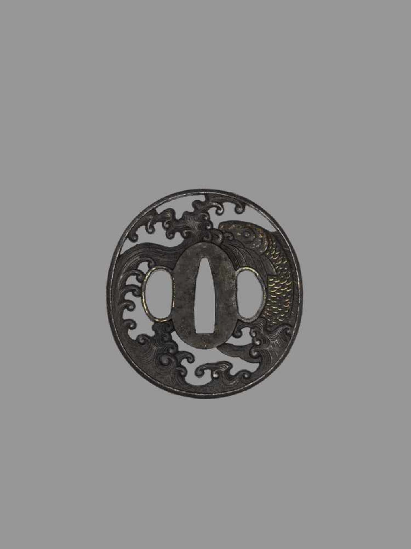 AN IRON TSUBA WITH CARP Japan, 18th century, Edo period (1615-1868)An iron tsuba of marugata shape - Image 3 of 4