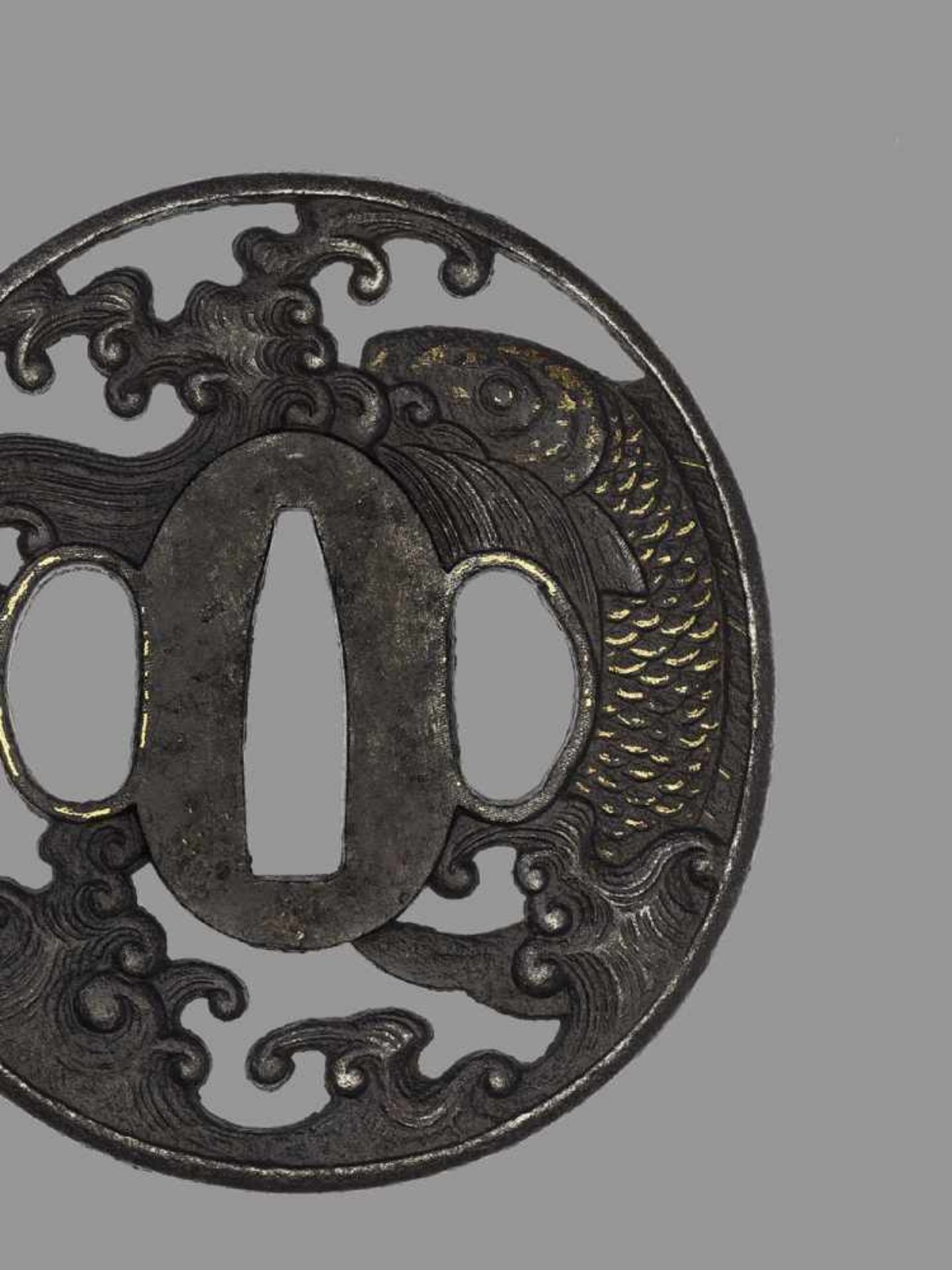 AN IRON TSUBA WITH CARP Japan, 18th century, Edo period (1615-1868)An iron tsuba of marugata shape - Image 4 of 4