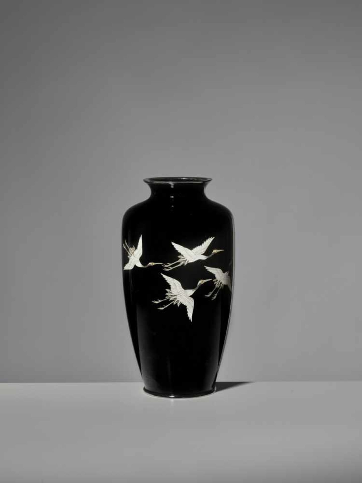 ANDO JUBEI: A FINE CLOISONNÉ ENAMEL VASE WITH CRANES By Ando Jubei (1876-1953), signed with the mark