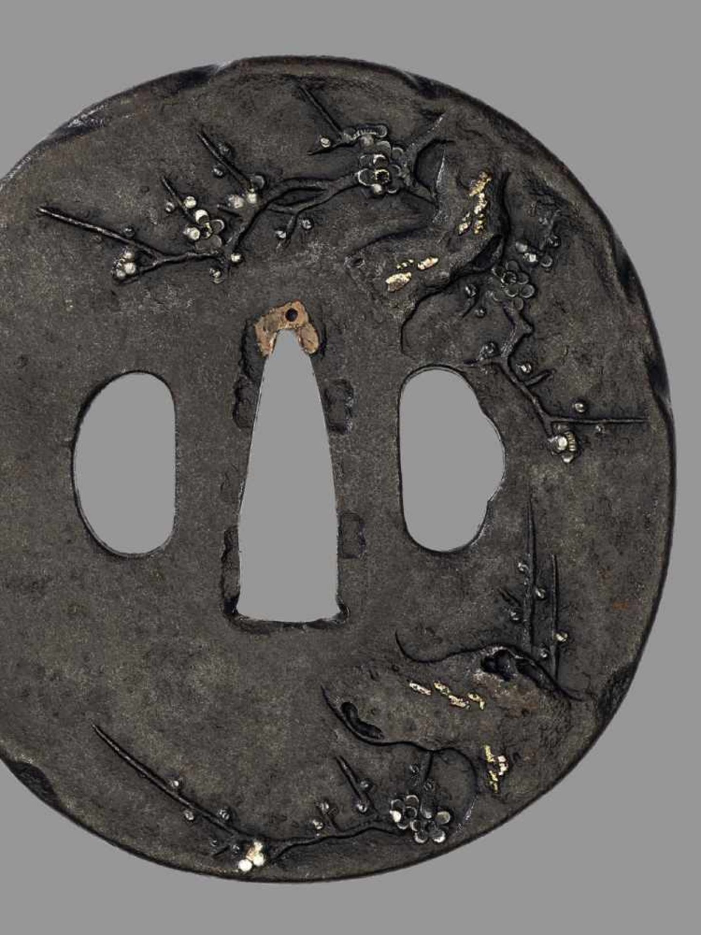 AN IRON TSUBA WITH CHERRY BLOSSOMS Japan, 17th century, Edo period (1615-1868)An iron tsuba of - Bild 2 aus 4