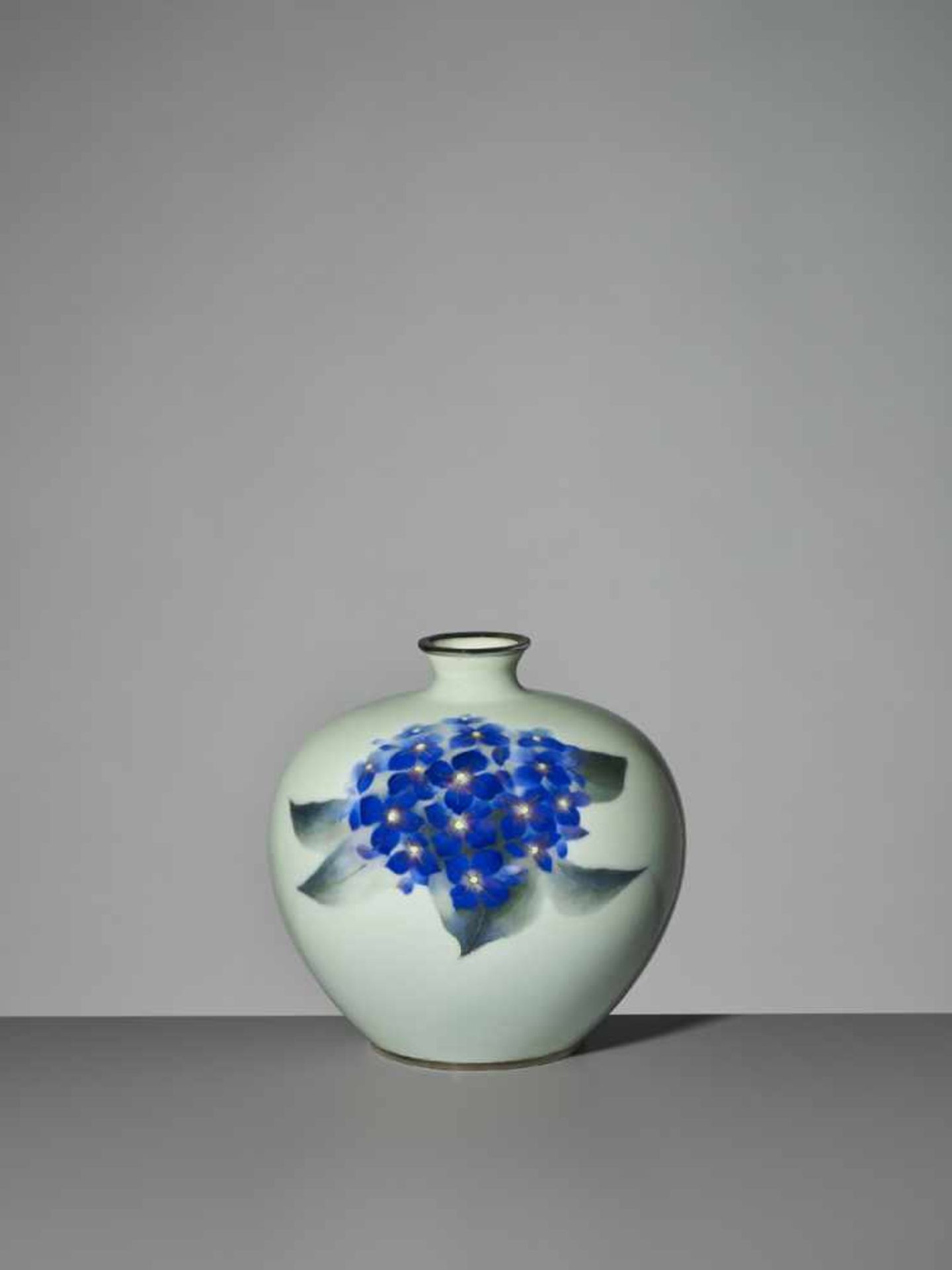 ANDO JUBEI: A FINE CLOISONNÉ ENAMEL VASE WITH VIOLETS By Ando Jubei (1876-1953), signed with the