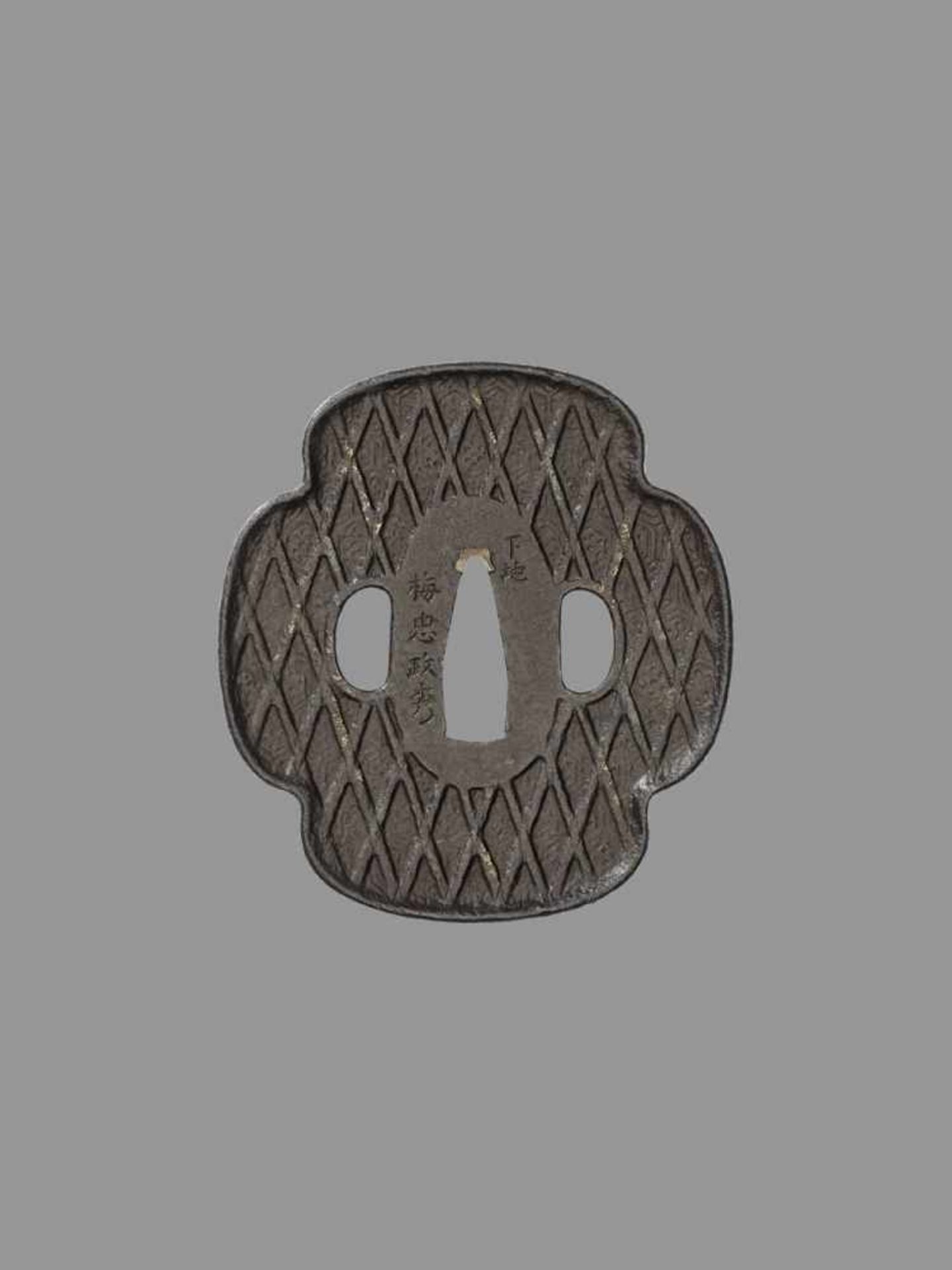 MASAHIDE AND MYOCHIN: A RARE NOBUIE TSUBA By Umetada Masahide and Myochin MuneyoshiJapan, Edo period