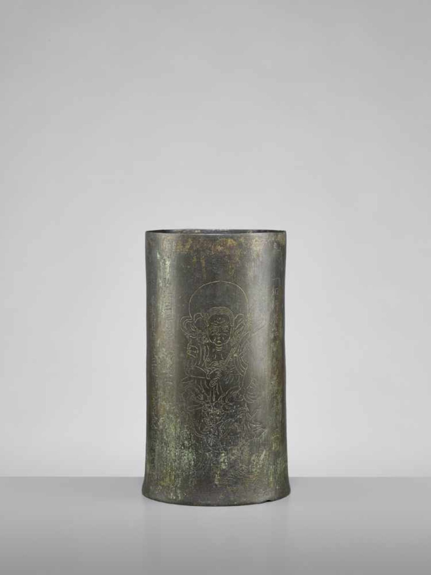 A VERY RARE AND EARLY BRONZE SUTRA CANISTER Japan, Muromachi period (1333-1573)The exterior of the