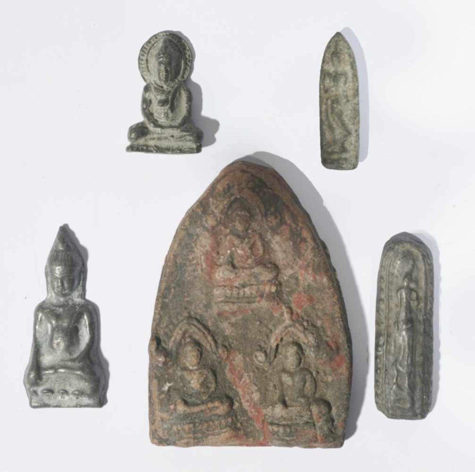 Five antique amulets, different materials, from 3,5 to 8,7 cm high, Provenance: Private