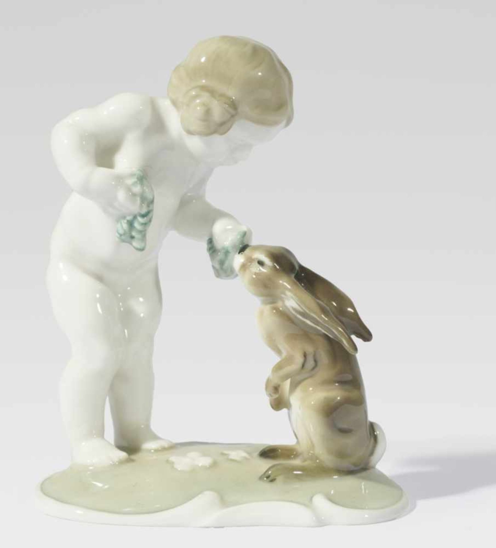 Girl feeds a rabbit, porcelain, polychrome painted. Lorenz Hutschenreuther, Selb Bavaria,