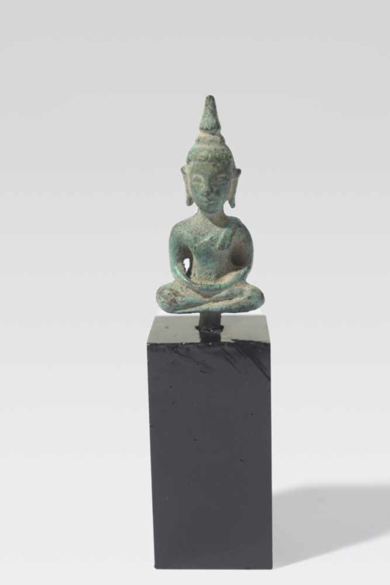 A Miniature-Buddha, Thailand, probably 19th c., 4,2 cm high (without pedestal),