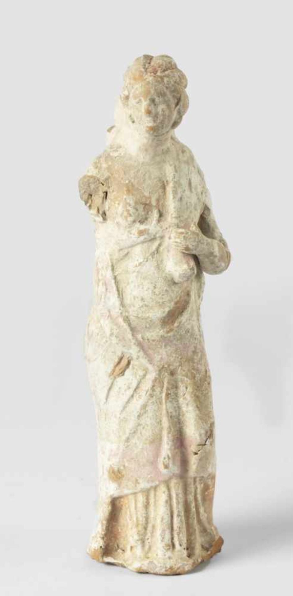 Standing woman, probably a maenad or a nymph, Apulia (Canosa), 3rd c. B.C., Red-brown clay