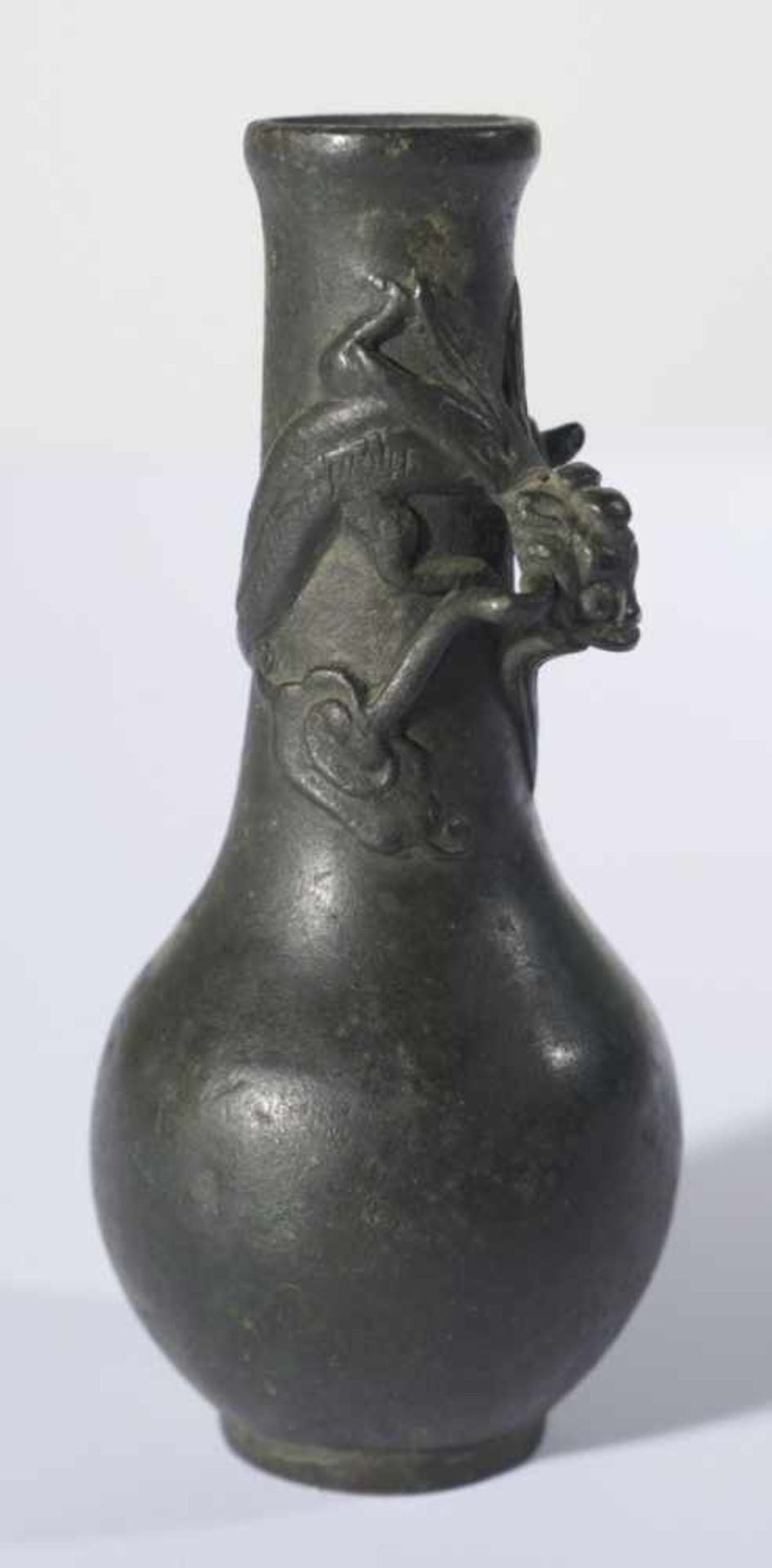 A little Bronze Chilong Bottle Vase, Japan, 19th c., condition: restored at the bottom.