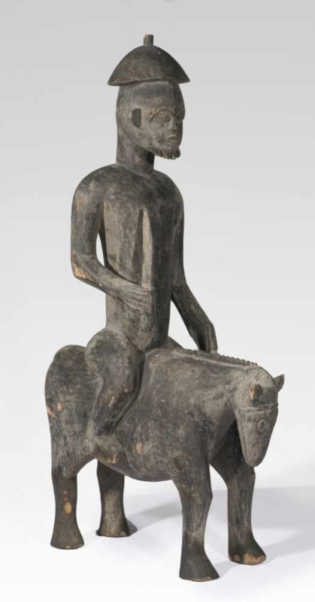Very large equestrian figure of a village policeman, Africa, wood carving, 20th c., 93 x