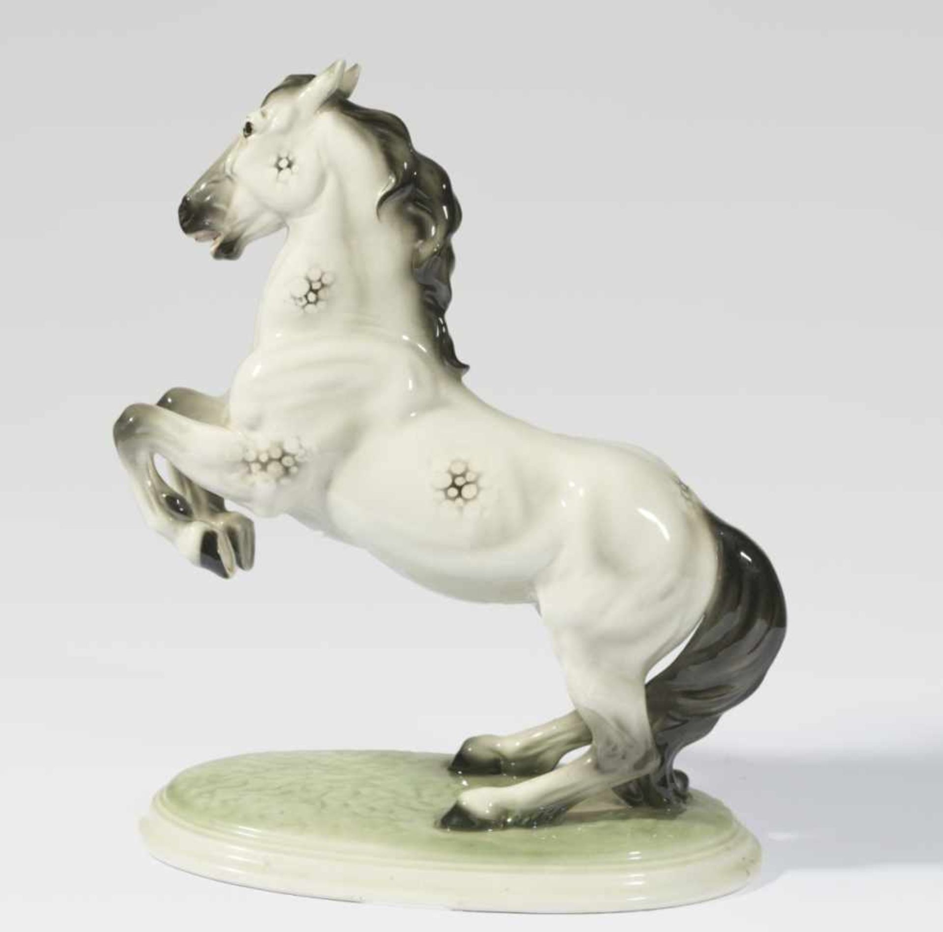 A rearing horse on an oval terrain base, Ceramic, grey or green. Vienna Keramos, mid 20th