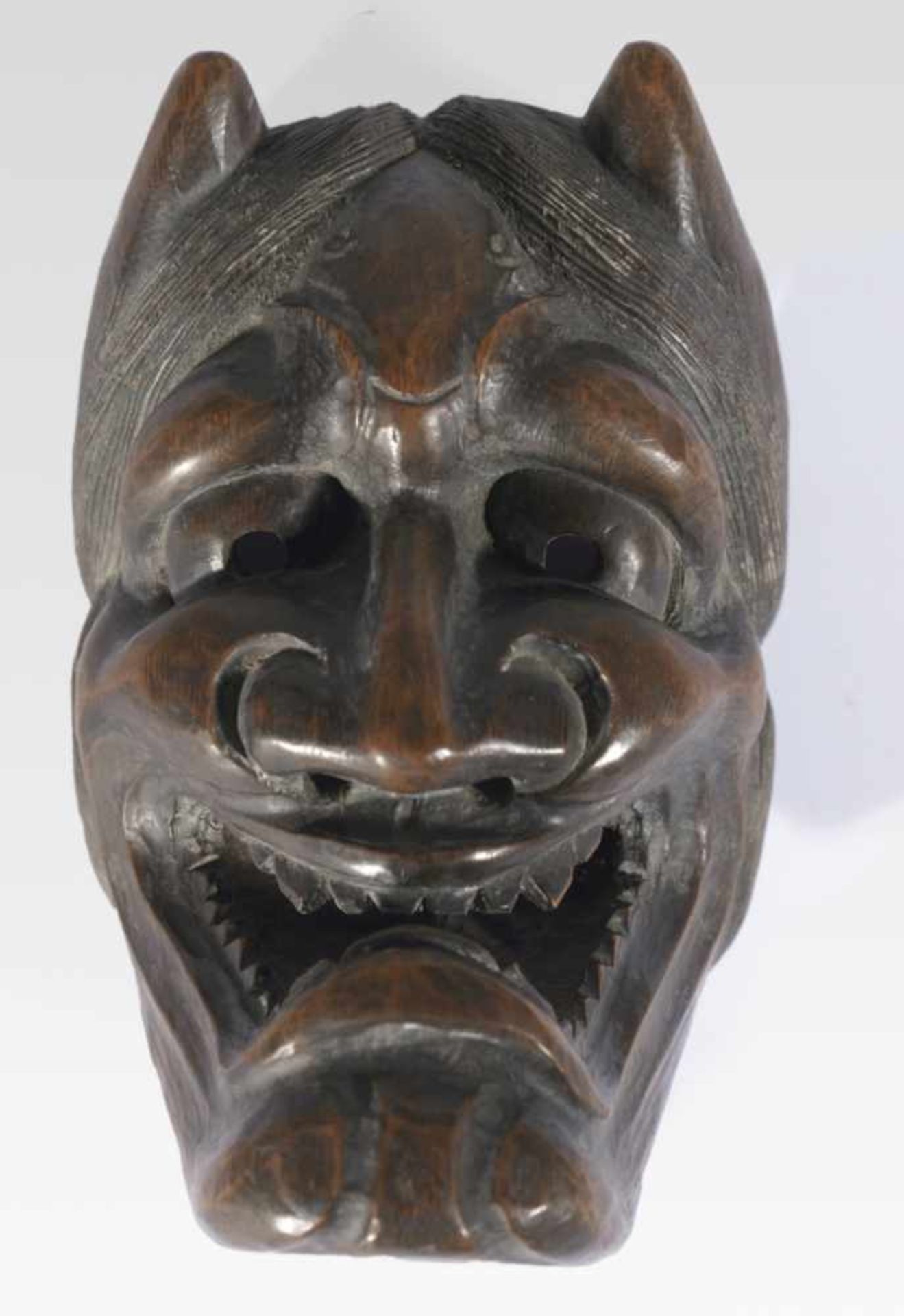 Small mask of a demon, Japan, wood carving, probably around 1900, 14 cm high, Provenance: