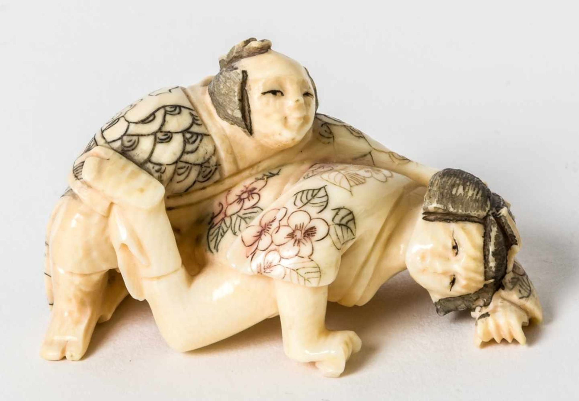 Netsuke with erotic scene, Japan, ivory carving, signed Matsuyama, probably around 1900,Length: 5,