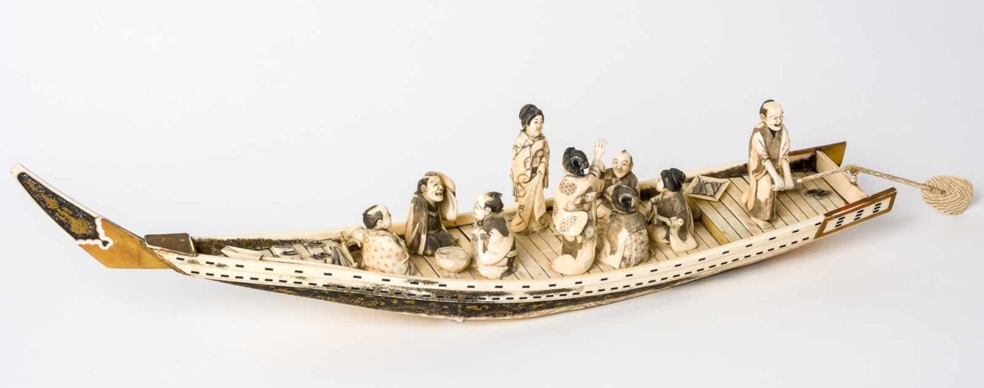 Rowing boat with funny company, Japan, ivory carving, signed, probably around 1900,Length: ca. 68 cm