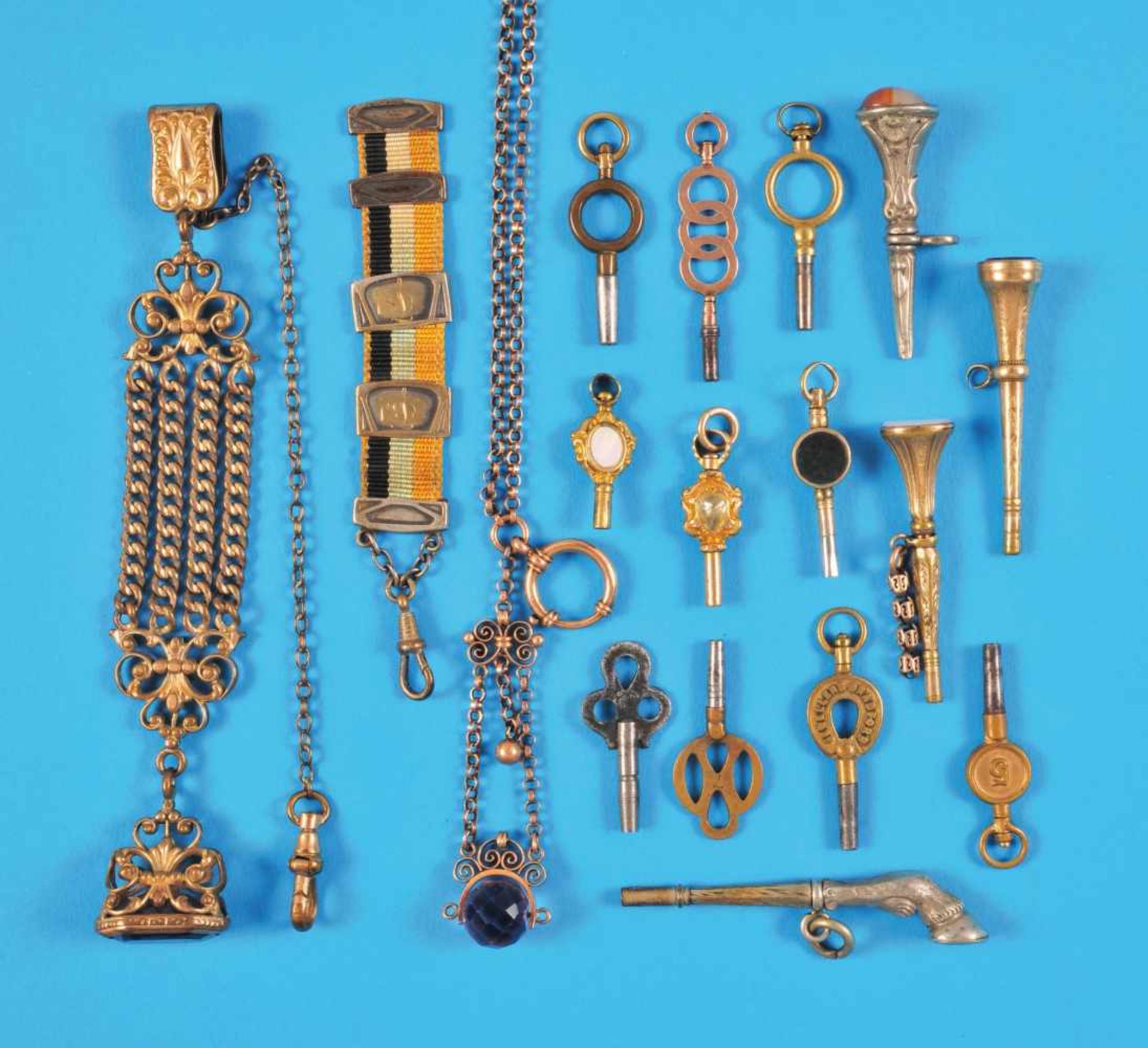 Bundle with 14 pocket watch keys, brass, silver, gold-platedKonvolut 14 Taschenuhrschlüssel,