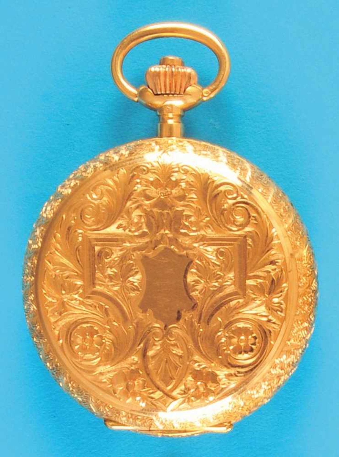 Goldne decorative pocket watch with spring coverGoldene Schmucktaschenuhr mit Sprungdeckel, mit