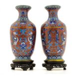 Pair of porcelain vases, China, XX Century, with base. H cm 35