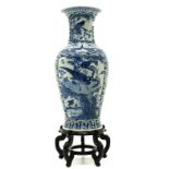 Vase with white background base, blue decorations. Japan, Early XX Century. H cm 119