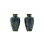 Pair of porcelain vases, China, XX Century. H cm 21