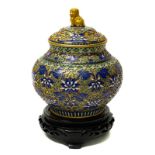 Vase with lid in gilded and enamelled metal, China, XX Century. H cm 19