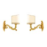 Pair of gilded wooden applique. XX Secolo. Cm 36 x 56, without lampshades. Shortcomings and