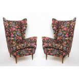 Two armchairs bergere model, from the 50s, with wooden structure and floreal fabric. Melchiorre