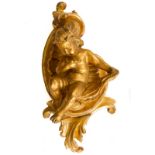 Small golden baked clay and golden wood putto. H cm 40