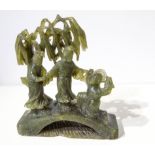 Jade statuette. Three people on a bridge and a tree. From Cina. Minor chips.