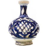 Bottle in majolica of Caltagirone, XVIII Century. White background with large blue flower. H cm 22