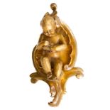 Small golden baked clay and golden wood putto. H cm 40