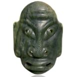 Nephrite mask, to be used as a pendant. China / Mongolia XIX - XX centuty. Cm 12.50 x 11