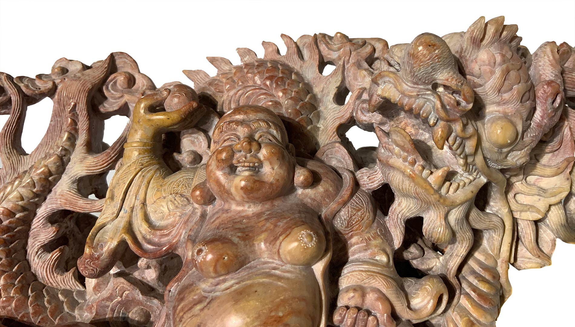 Sophisticated and detailed stone carving soapstone depicting Budai with dragon, fruit and clouds. - Image 3 of 3