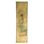 Roll of paper with courtly figure and texts. China, XX century. 130 x 35 Cm.