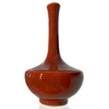 Bottle shaped vase with large, red glaze belly "sangre de boef". With apocryphal mark on the base.