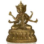 bronze sculpture of the goddess Tara depicted with eight arms and three heads. Tibet, 19th / 20th