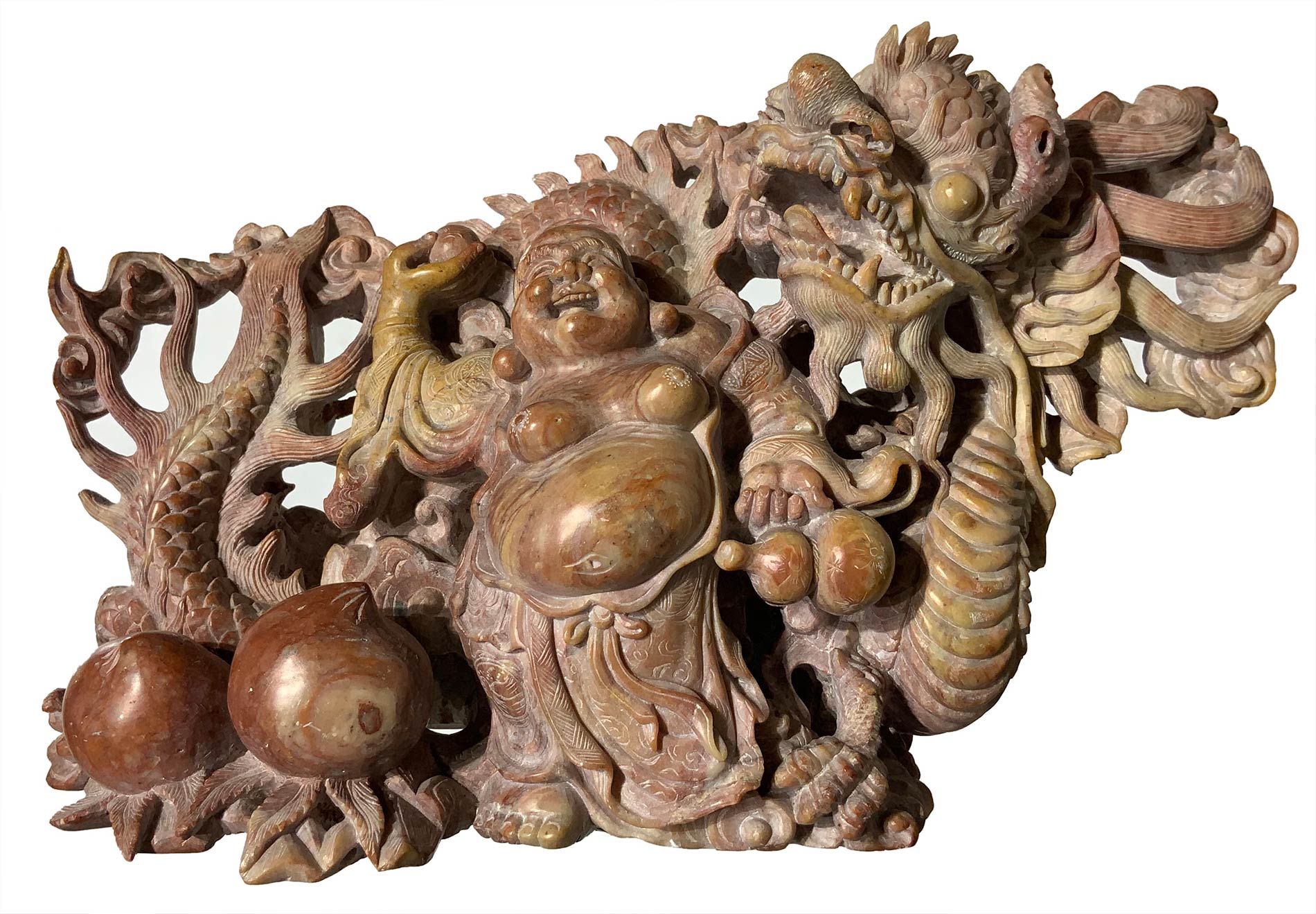 Sophisticated and detailed stone carving soapstone depicting Budai with dragon, fruit and clouds.