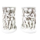 Pair of Capodimonte porcelain vases, 20th century. White angels decorations. H cm 11