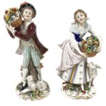 Pair of Capodimonte porcelain statuettes, 20th century. Young shepherds. H cm 20, cm19