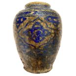 Vase Persian glazed, in colors of blue, nineteenth century. H 26 cm, max width 22