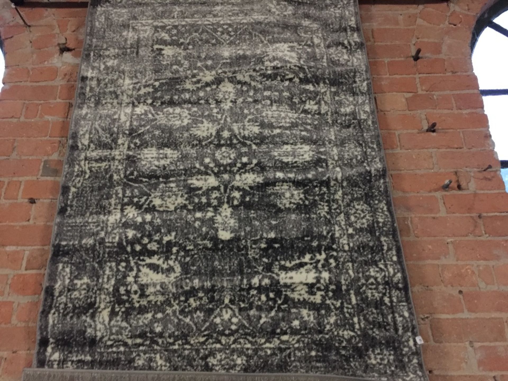 GREY AND NATURAL RUG