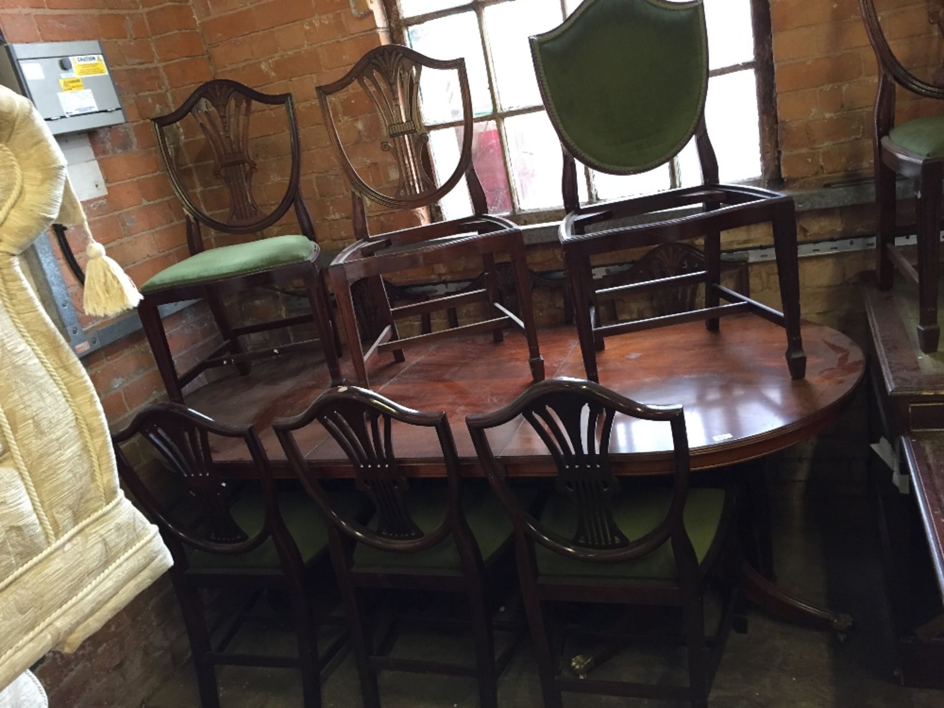 MAHOGANY EXTENDING TABLE AND 10 CHAIR (SOME MISSIN