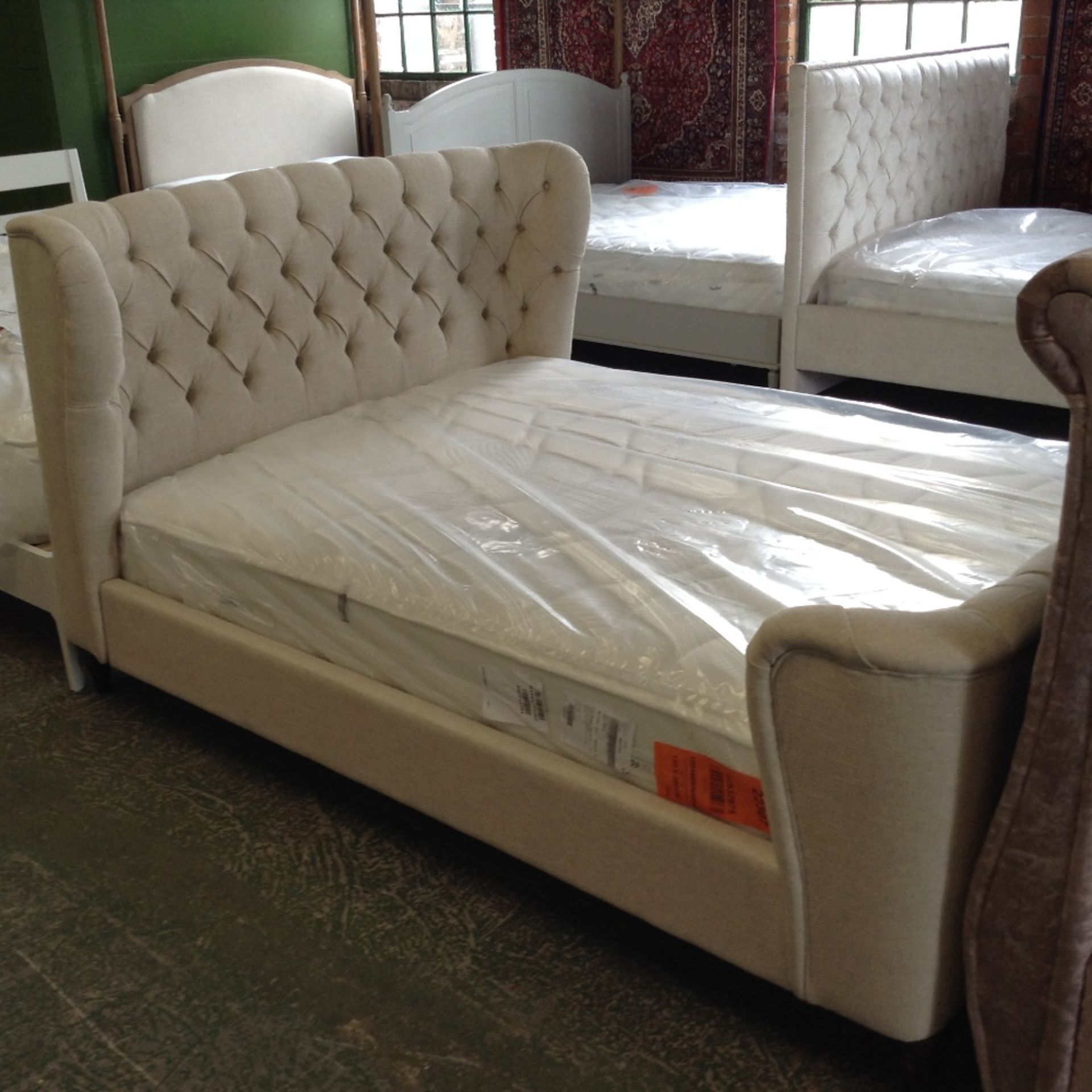 BEIGE UPHOLSTERED KING SIZE BED FRAME