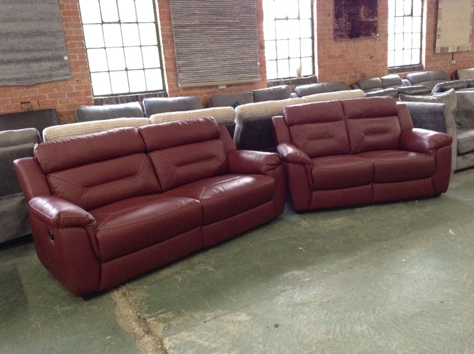 RED LEATHER WITH WHITE STITCHING MANUAL RECLINING