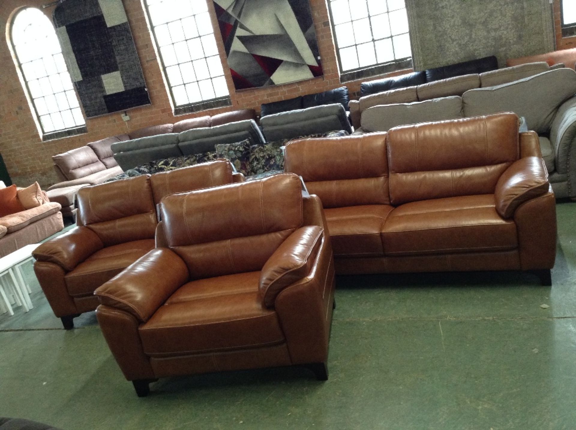 BROWN LEATHER WITH WHITE STITCHING 3 SEATER SOFA