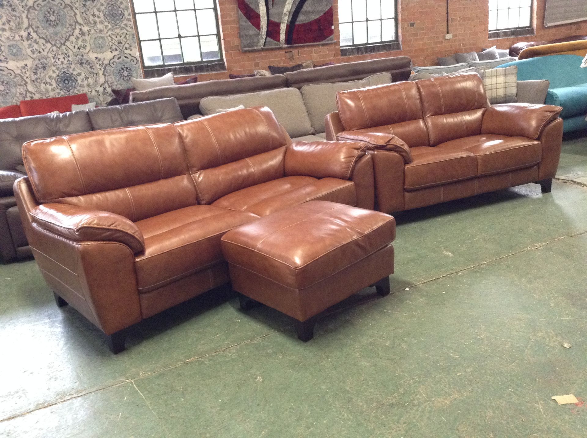 BROWN LEATHER WITH WHITE STITCHING 3 SEATER SOFA ,