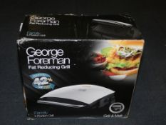 Boxed George Foreman 4 Portion Fat Reducing Health Grill RRP £50 (Customer Return)
