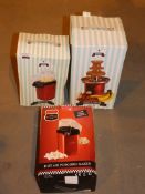 Lot to Contain 4 Boxed Assorted Kitchen Items To Include Popcorn Makers, Chocolate Fountains and