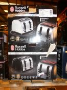 Lot to Contain 2 Boxed Russell Hobbs 4 Slice Toasters in Cream and Black RRP £100