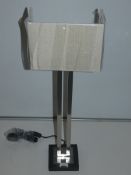 Stainless Steel Double Rim Designer Table Lamp With Linen Shade From A High-End Lighting Company (