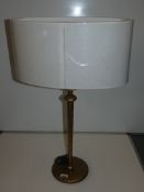 Gold Painted Hammered Effect Designer Table Lamp With Fabric Shade From A High-End Lighting